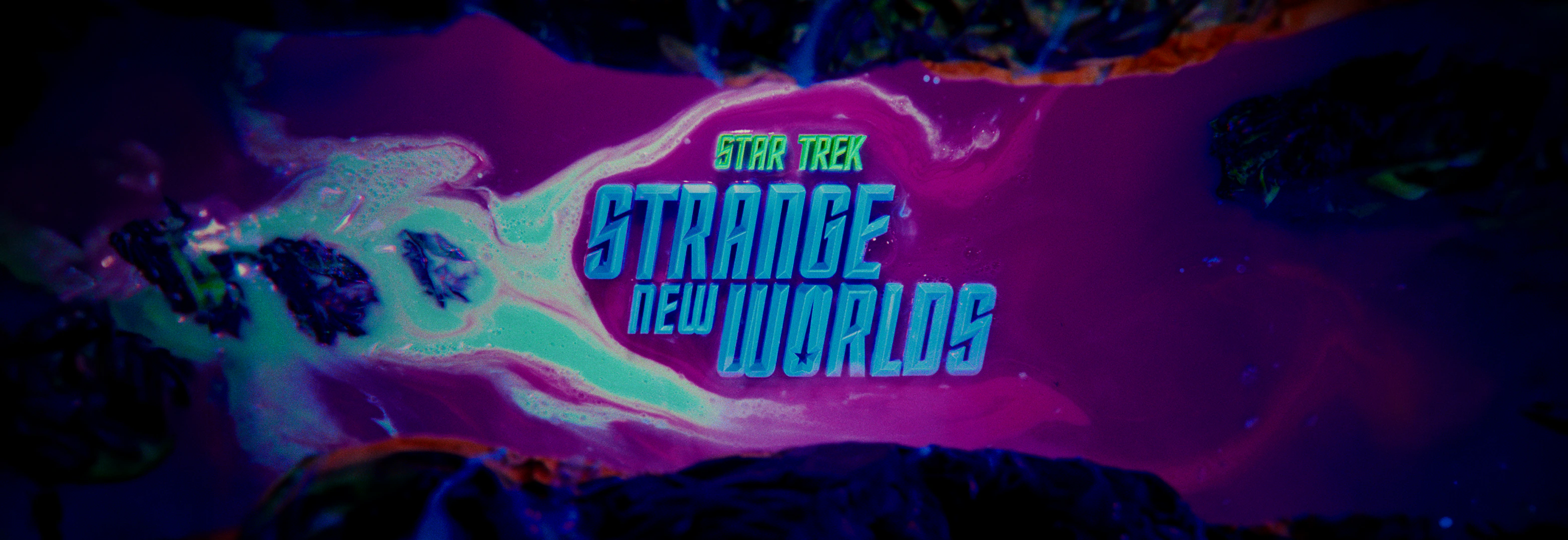 A luminous pink-and-green slime river surrounds the fixed Star Trek: Strange New Worlds title.